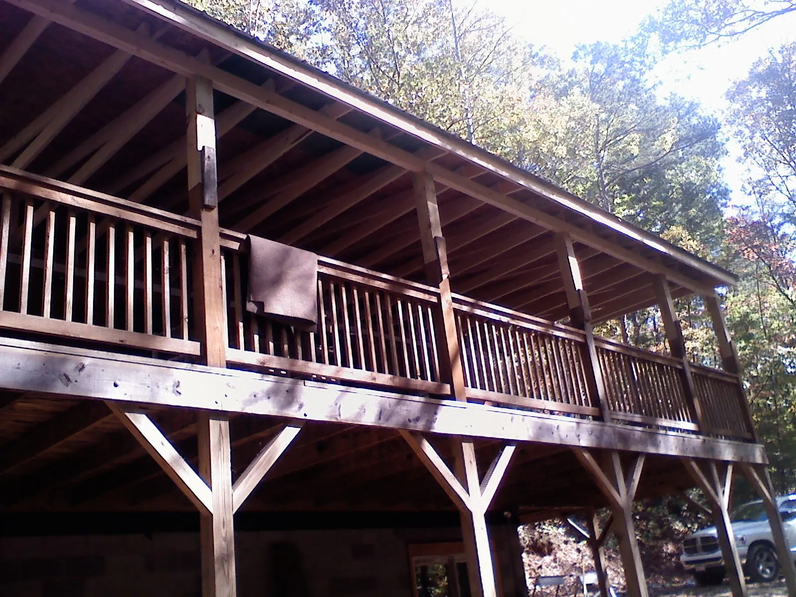 Timber framing under a new elevated porch and deck — Roof Leak Repair in Austin by Roofing Brothers